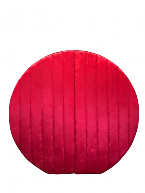 Plush red circular panel
