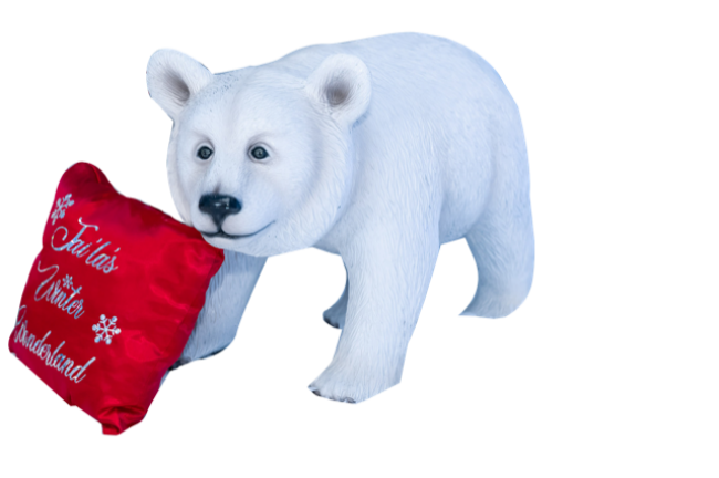 Toy bear with Christmas-themed pillow