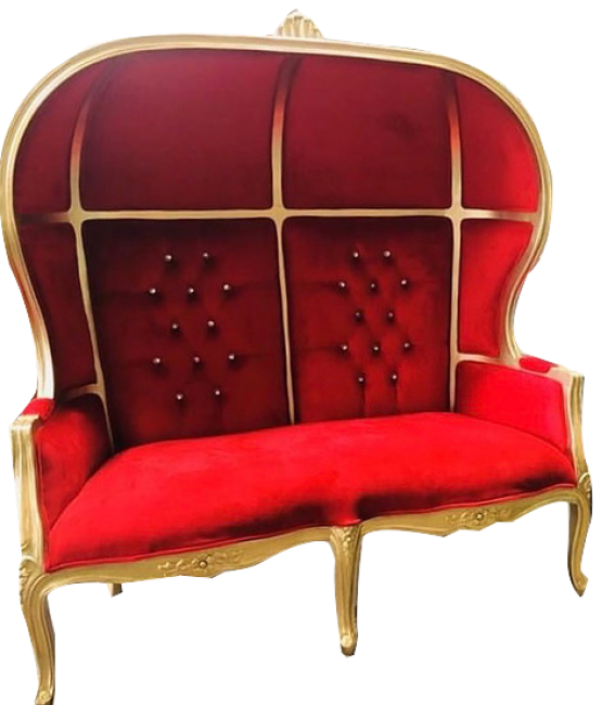 Luxurious red velvet loveseat with gold frame