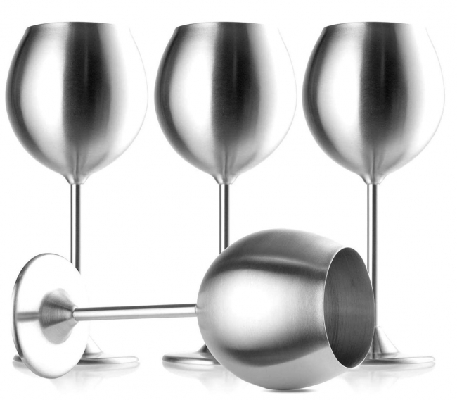 Four metallic wine goblets displayed