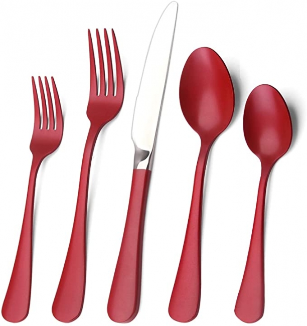 Red cutlery set on white background