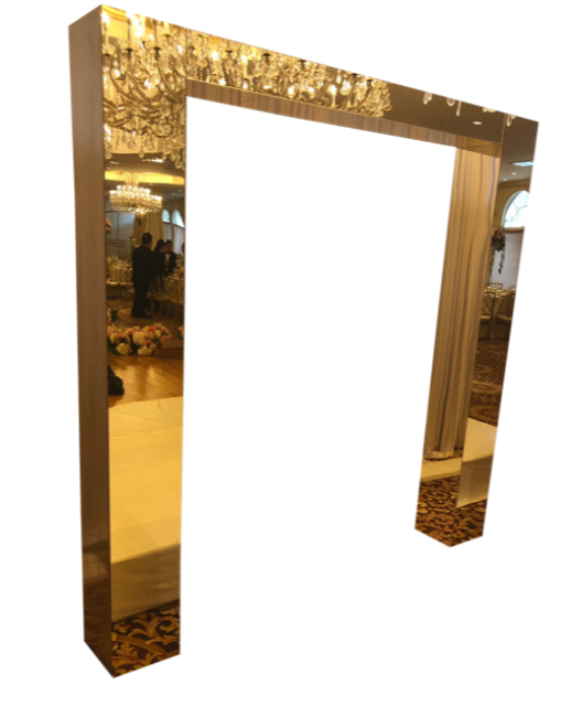 Golden mirrored doorway in elegant setting