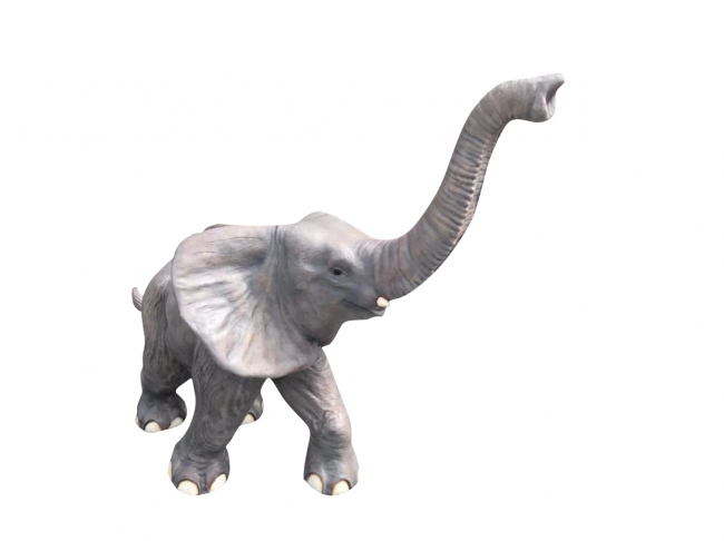 Elephant sculpture isolated on white backdrop.