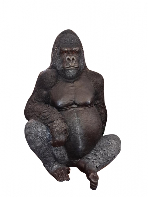 Gorilla statue sitting on white background