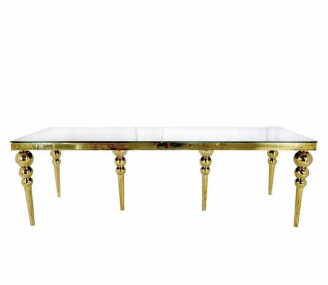 Elegant gold table with glass top