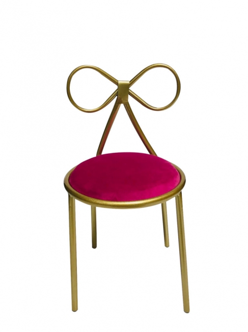Gold chair with pink cushion