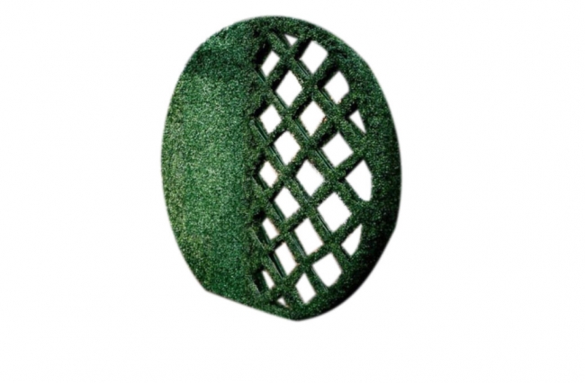 Textured green circle with cutouts