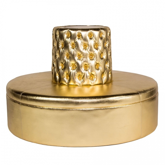 Luxurious gold seating with tufted design