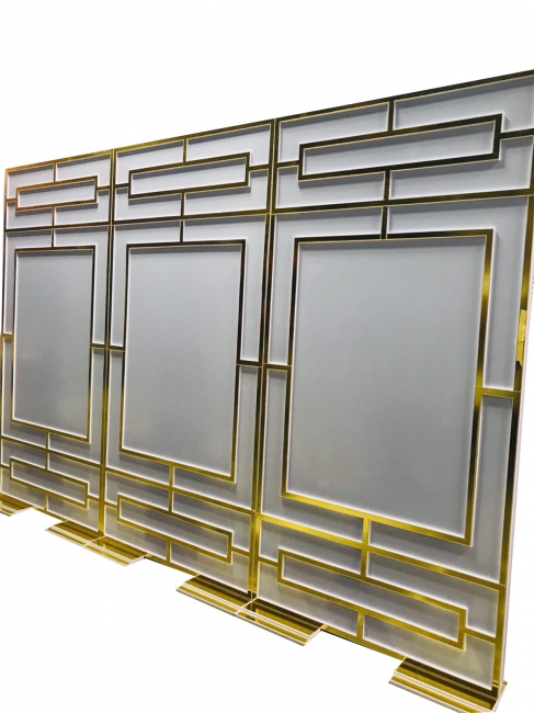 Geometric gold and frosted glass panel