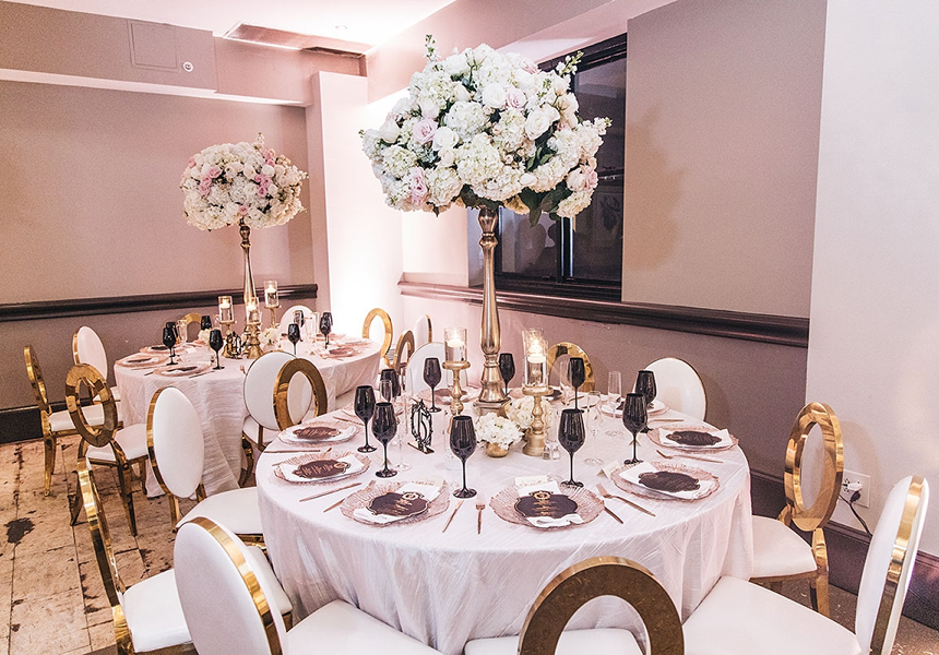 Elegant wedding table with floral centerpiece
