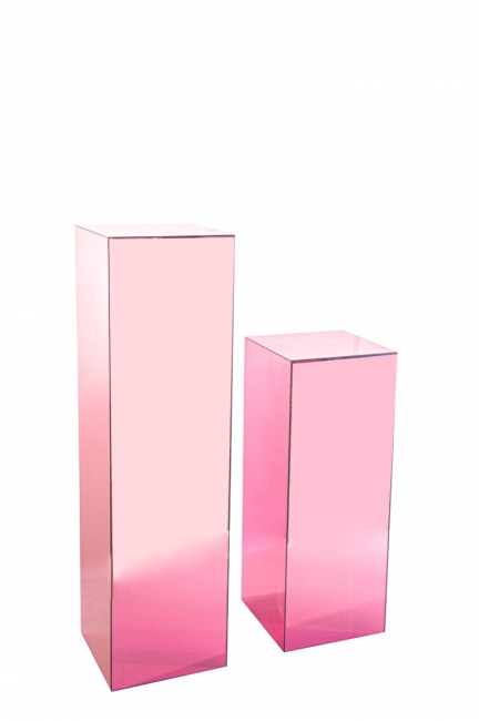 Tall and short pink glass pillars