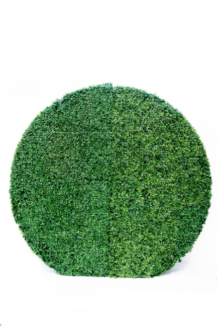 Greenery circle backdrop on display