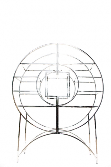 Circular metal structure with intricate design
