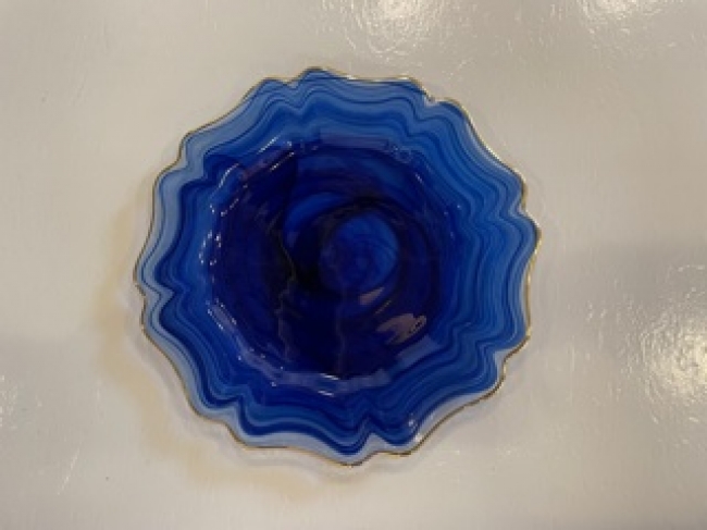 Vibrant blue mineral with rippled design