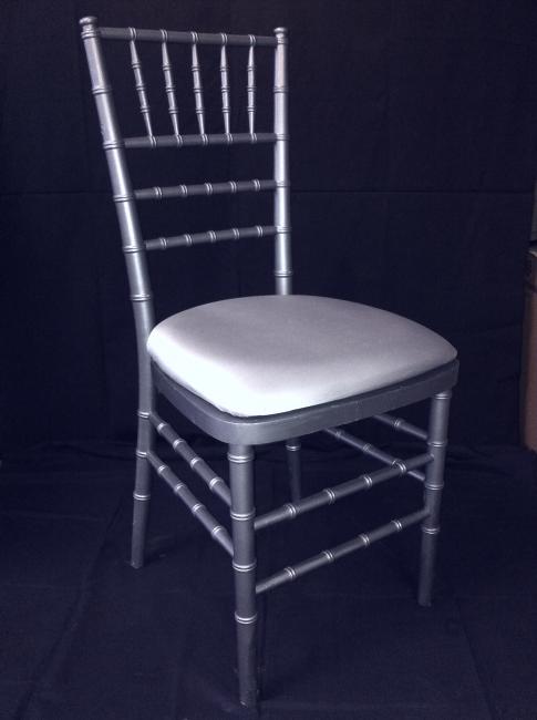 Silver chair with cushioned seat