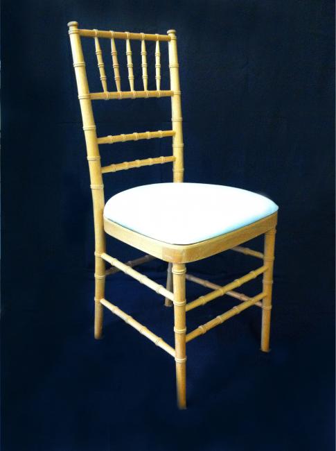 Elegant wooden chair on dark background