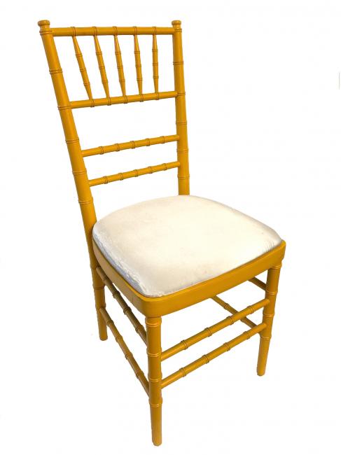 Yellow wooden chair with cushioned seat