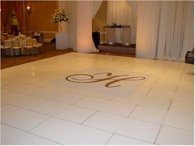 White tiled dance floor with drapes