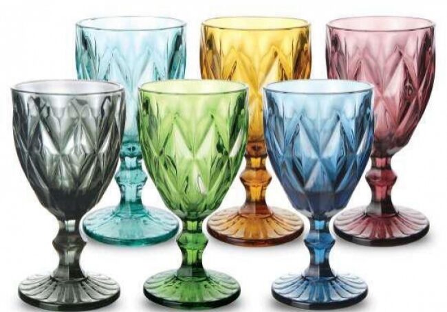 Vibrant glassware set on white background