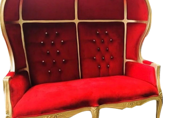 Luxurious red velvet loveseat with gold frame