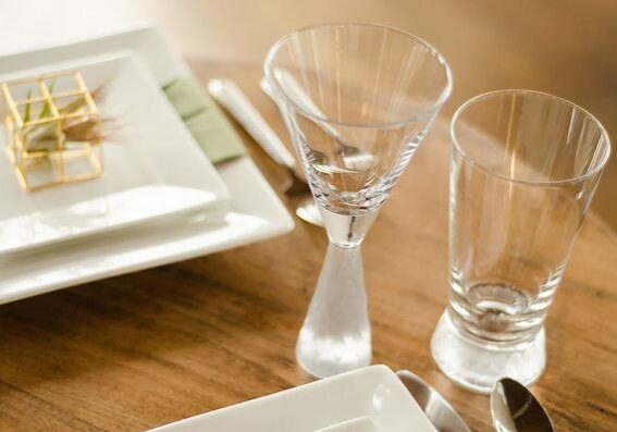 Minimalist table arrangement with cutlery and glassware