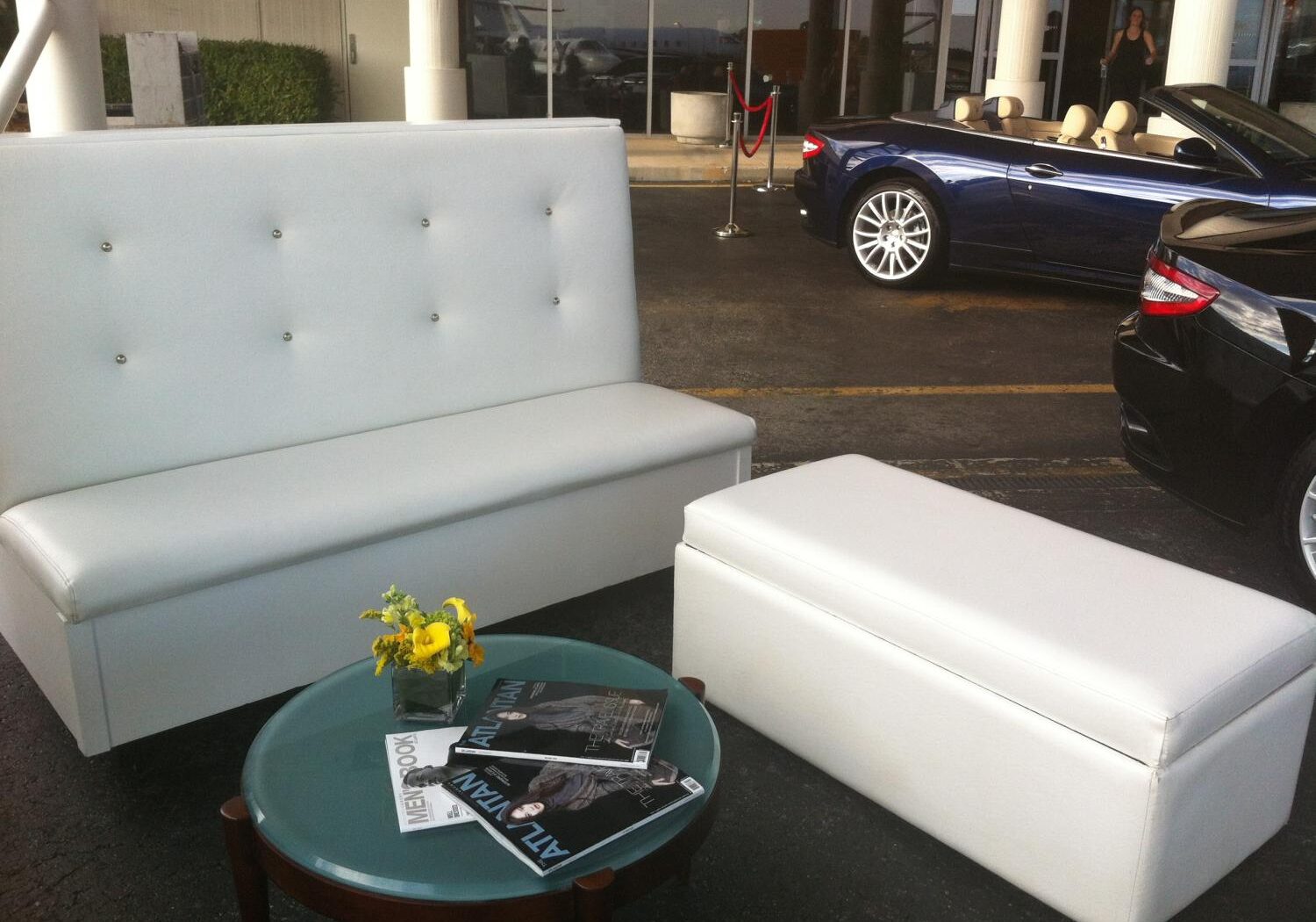Elegant seating arrangement by parked convertible