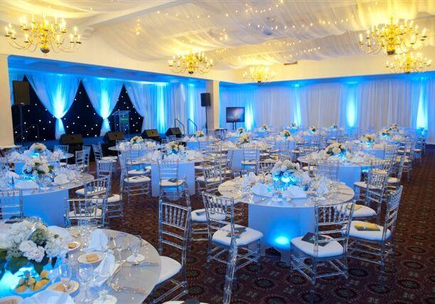 Elegant banquet hall with blue lighting