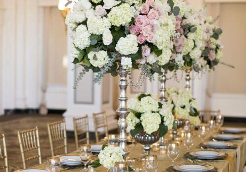 Lavish dining setup with gold chairs