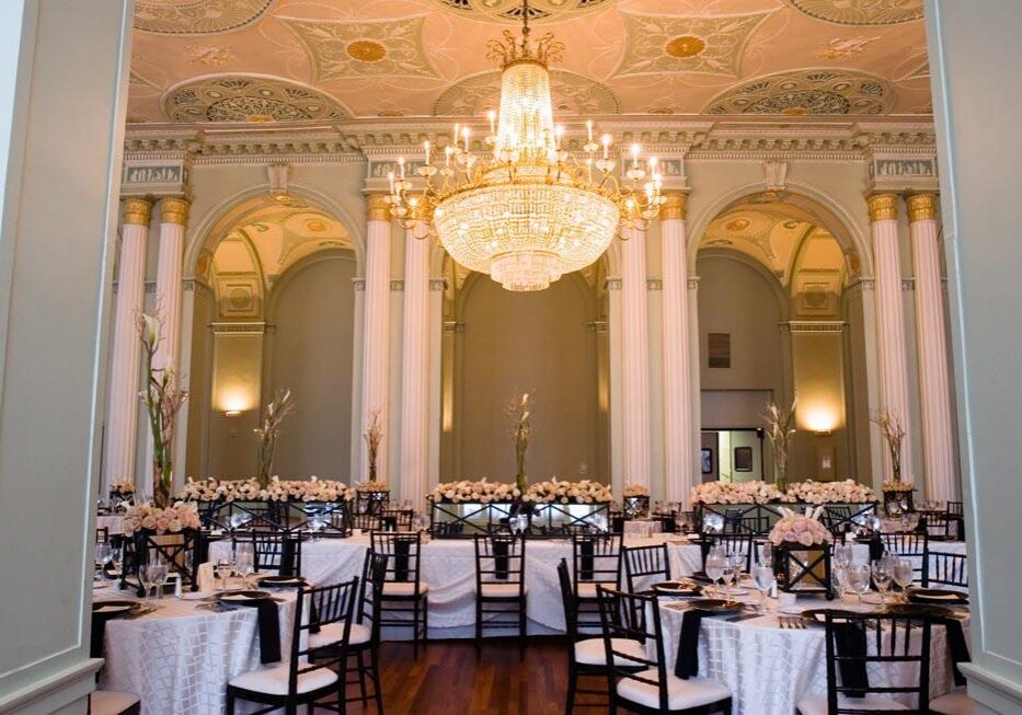 Ornate ballroom with decorated tables