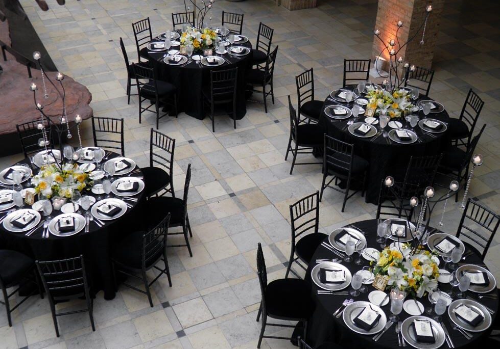 Black and white table settings for event