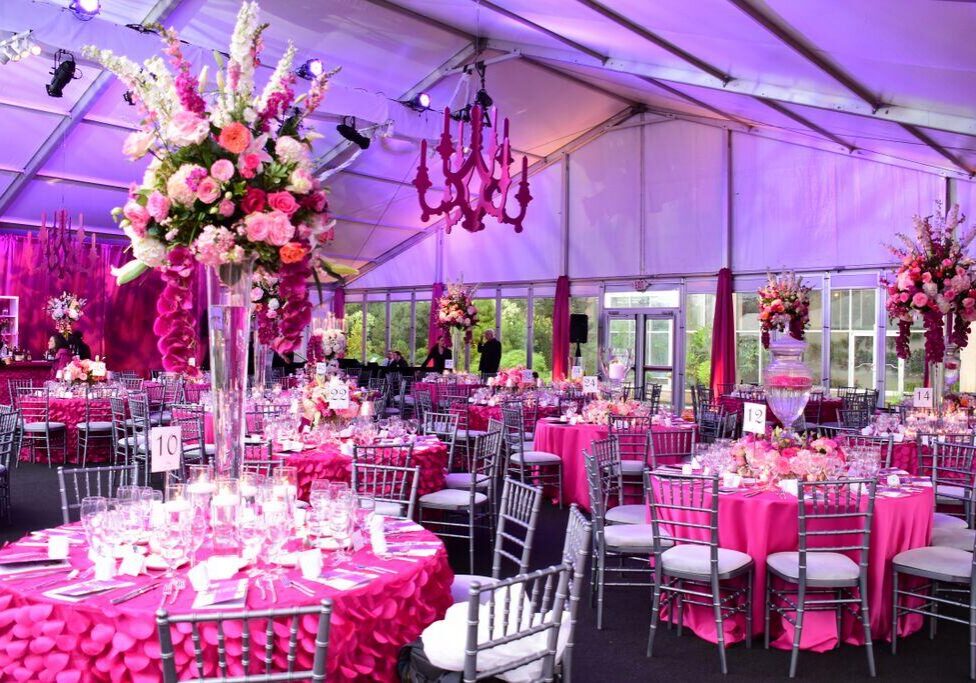 Luxurious event setup featuring floral centerpieces