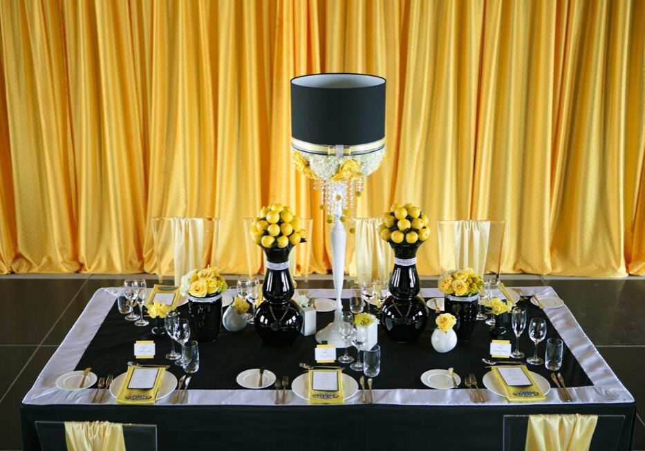 Elegant table setting with yellow flowers