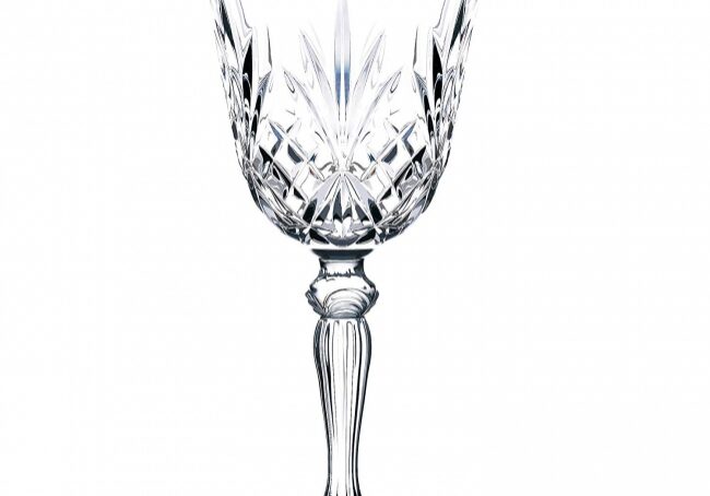Decorative crystal goblet on white background