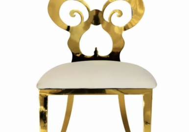 Elegant gold chair with white cushion