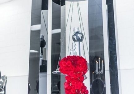 Contemporary installation featuring reflective pillars.