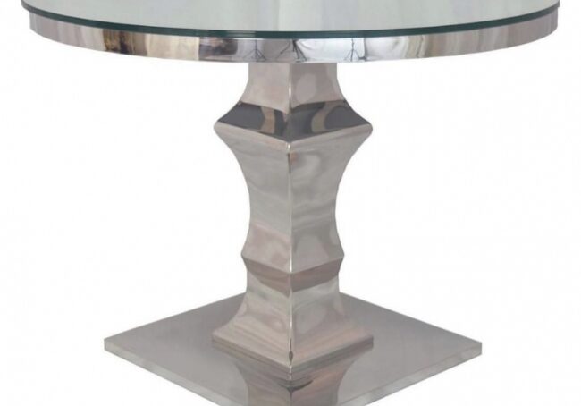 Sleek dining table featuring glass and metal.