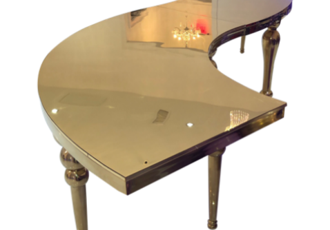 Stylish crescent-shaped mirrored furniture piece