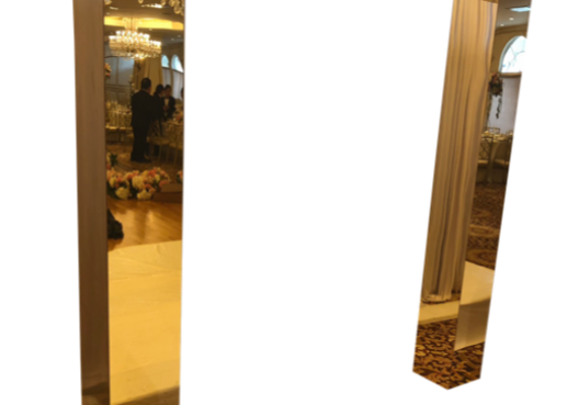 Golden mirrored doorway in elegant setting