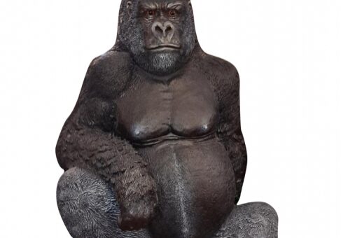 Gorilla statue sitting on white background