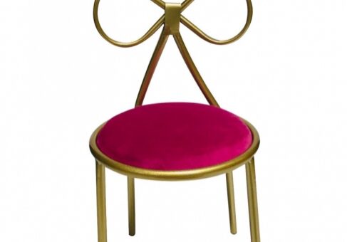 Gold chair with pink cushion