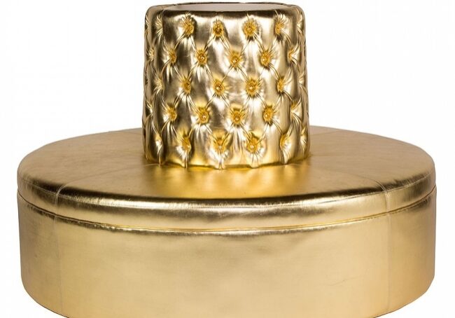 Luxurious gold seating with tufted design