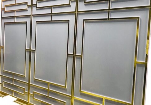 Geometric gold and frosted glass panel