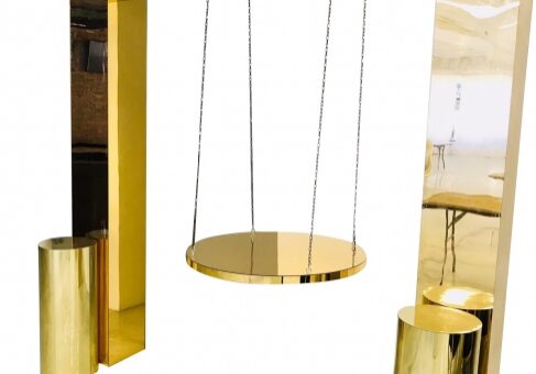 Shiny metallic swing installation