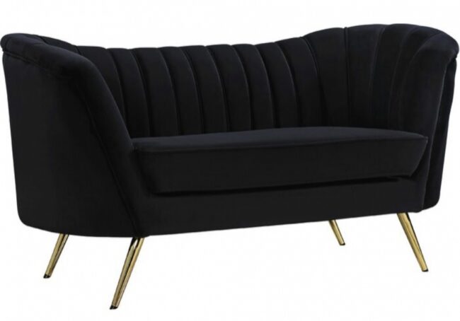 Black velvet sofa with gold legs