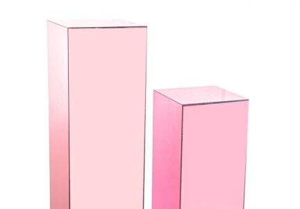 Tall and short pink glass pillars