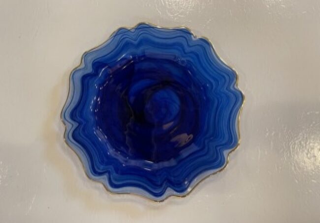 Vibrant blue mineral with rippled design