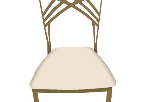 A wooden chair with a cream-colored cushioned seat and an intricate geometric pattern on the backrest.