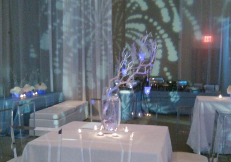 White tablecloths and decorative centerpiece