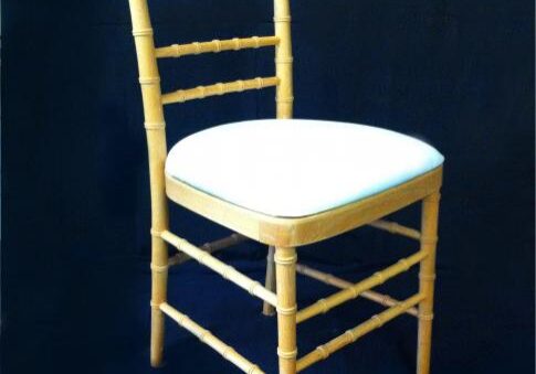 Elegant wooden chair on dark background