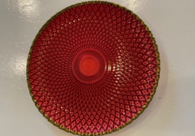Elegant red dish with geometric pattern